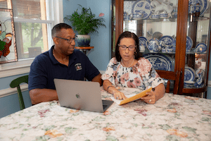 Family members discussing documents
